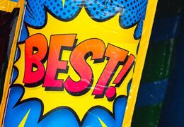 Kaufen Sie das A-frame Super Comic Hüpfburg mit Comicstreifen-Design, perfekt für Vermieter