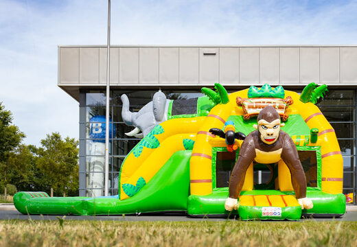 Bestellen Sie Multi super aufblasbare Hüpfburg mit Rutsche im Dschungel-Thema grün gelb für Kinder